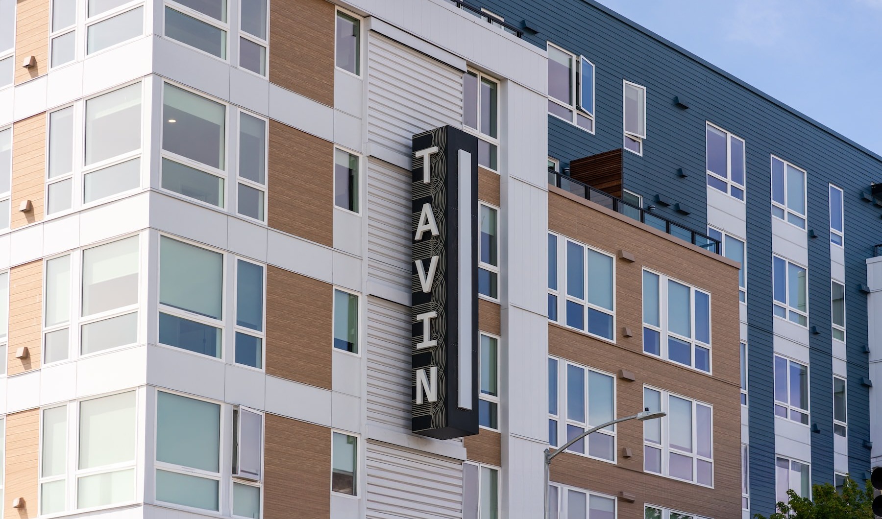 the side of a building with a sign