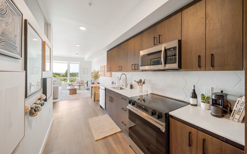 a kitchen with wood cabinets