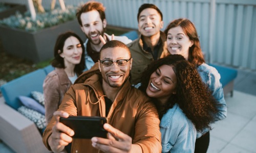 a group of people posing for a photo